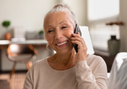 Eldery person on a call with a nurse